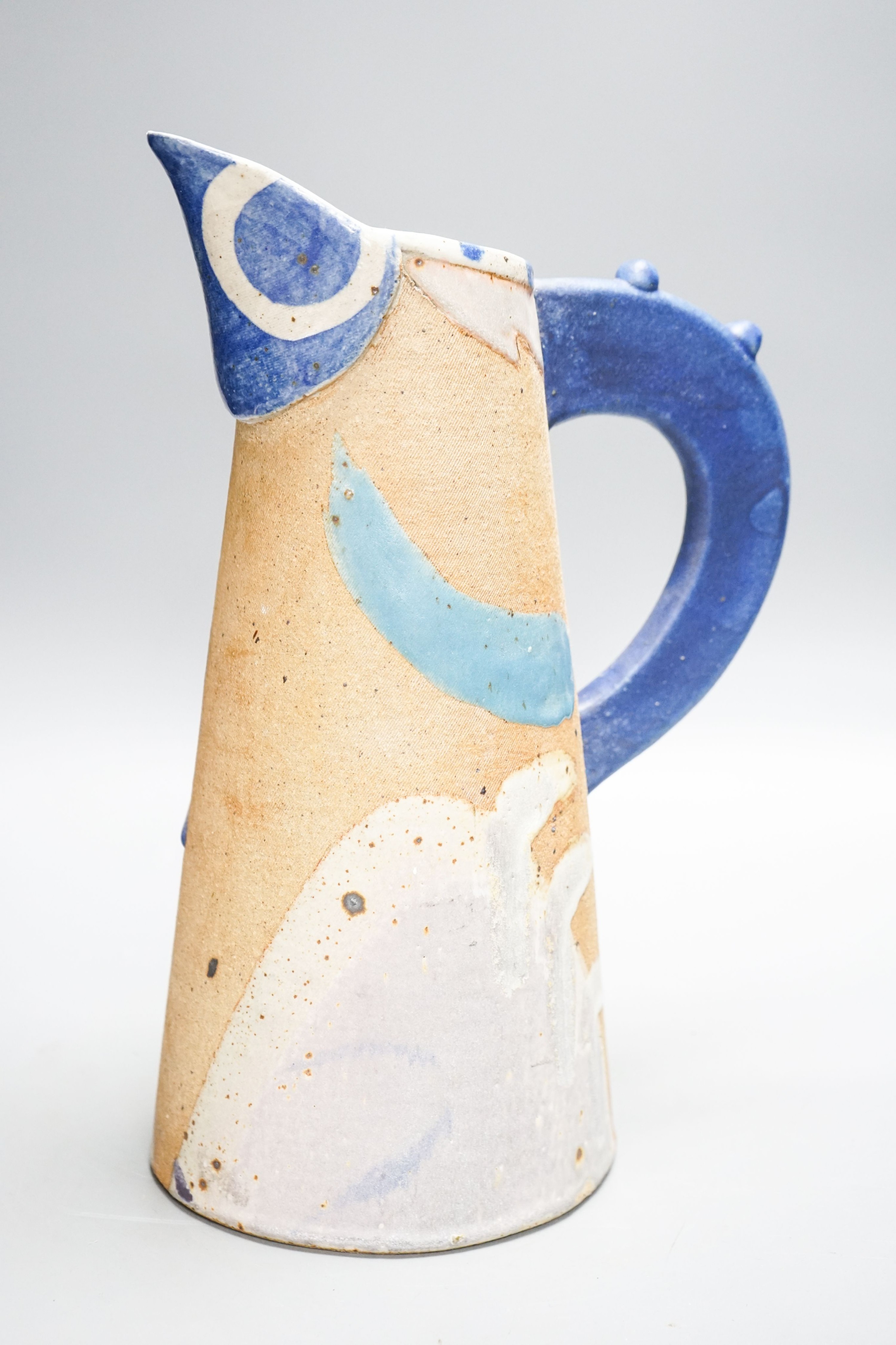 Jill Fanshawe Kato (b.1943), a tall slip decorated stoneware jug 35cm